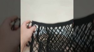 Обзор сетки в салон между сиденьями автомобиля