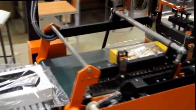 Видео ТМ-2А Упаковка кондитерских изделий в ПОФ пленку. смотреть онлайн