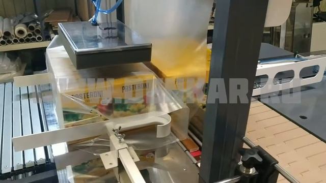 Автоматическая упаковка макаронных изделий в картонных коробках в термоусадочную плёнку. смотреть онлайн