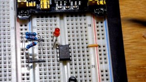 LM393 comparator IC non inverting basic LED on off circuit controlled by trimpot voltage divider