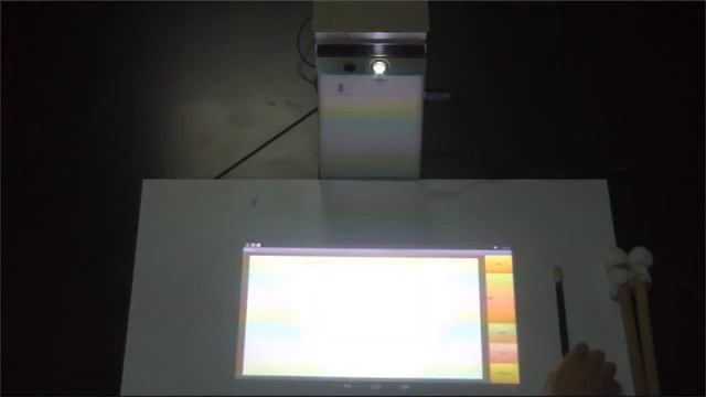 Laser Touch Mini Projector can transform any surface into an Android-tablet screen смотреть онлайн