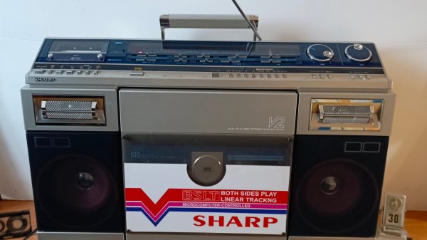 Sharp vz-v2 слушаем смотрим