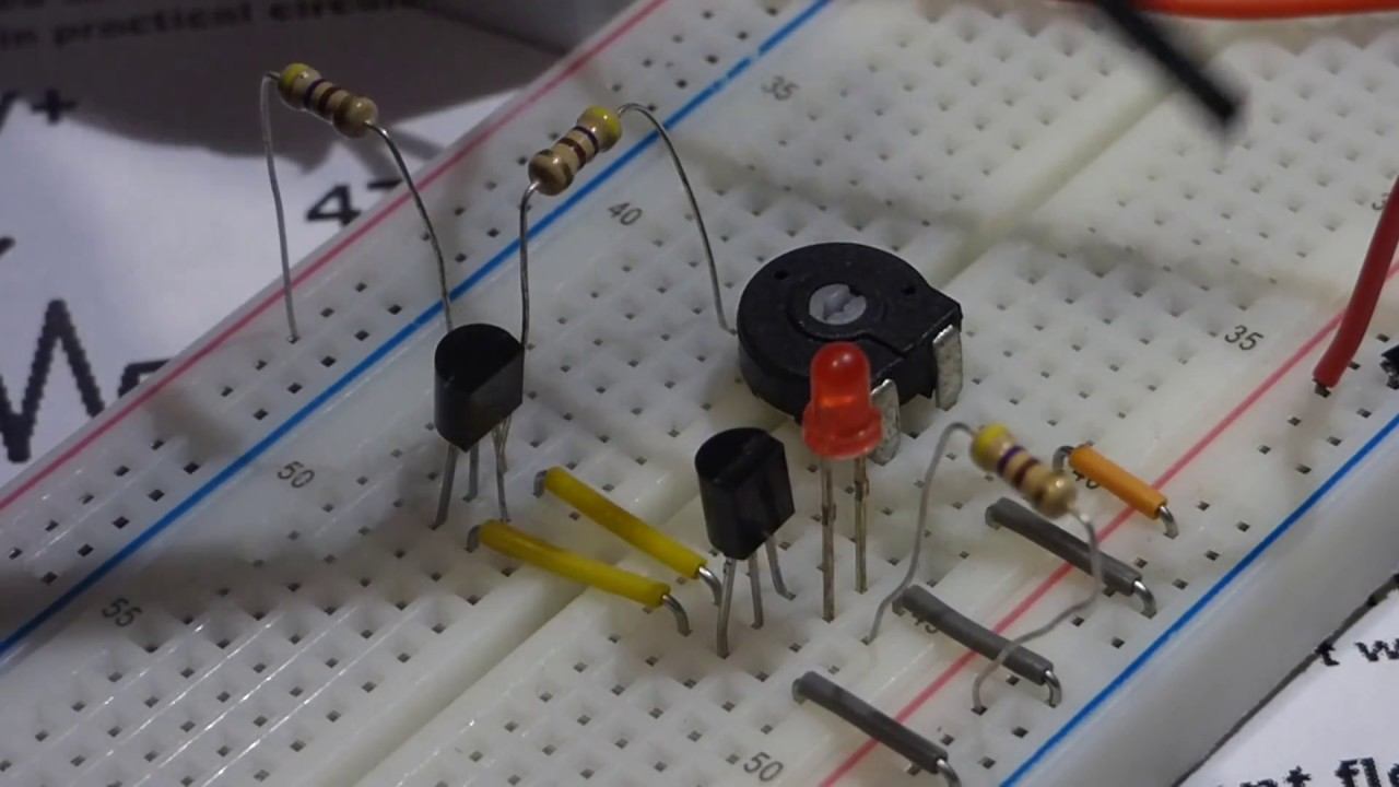 Two 2n2222 NPN transistors wired as a schmitt trigger for electronics demonstration circuit смотреть онлайн