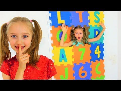 Polina Made The Door Of Colored Blocks. Kids Play With Toys