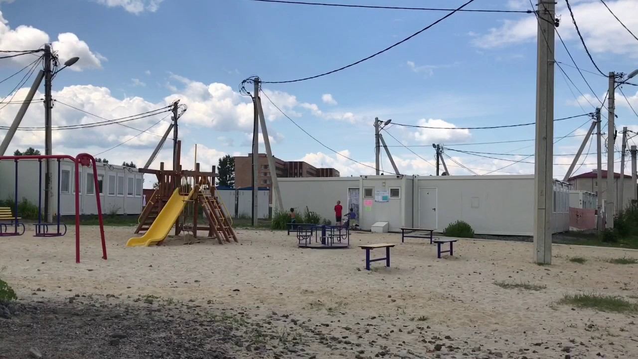 Как живут переселенцы из Мариуполя в модульном городке смотреть онлайн