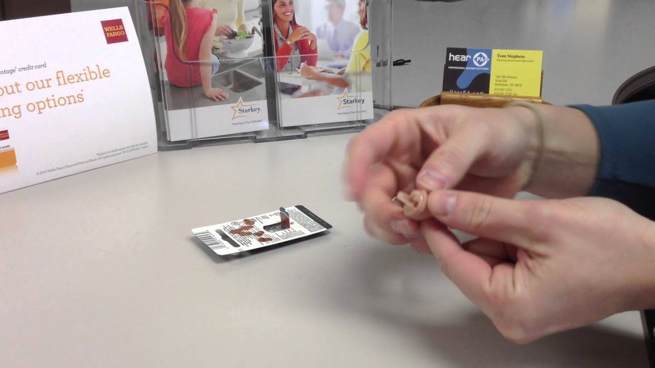 How to change the battery on a custom hearing aid смотреть онлайн