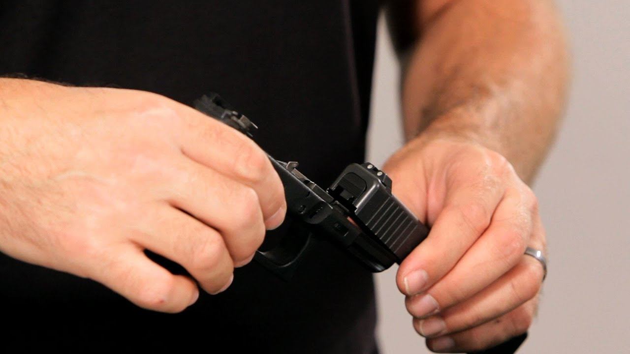How to Disassemble a Glock 23 | Gun Guide смотреть онлайн
