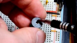 Active buzzer low light alarm made with LM358 op amp comparator with LDR and 2N3904 NPN BJT circuit