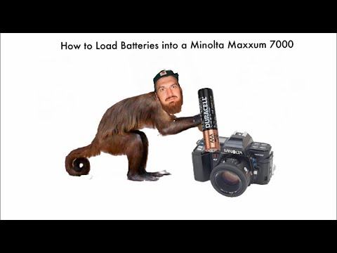 How to Load Batteries into a Minolta Maxxum 7000 смотреть онлайн