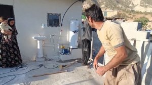 Professor Nowruz and his family at work in Khosrow's farm