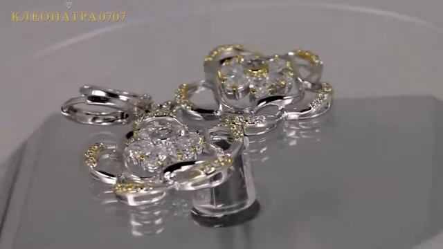 Серьги с фианитами, покрытые золотом и платиной смотреть онлайн