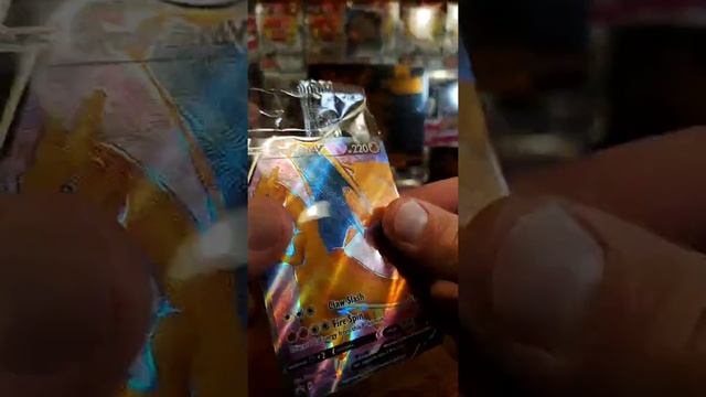 Shiny Charizard V Champion's path pulled in a crazy elite trainer box break war!! смотреть онлайн