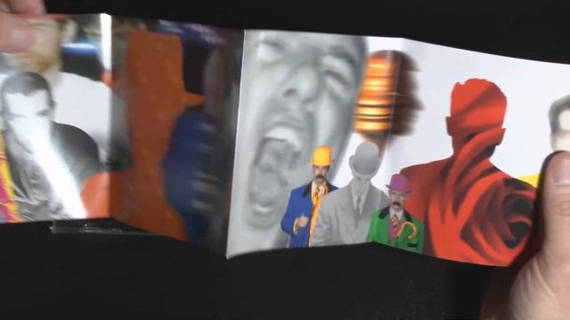 Unpacking and viewing the CD of the Pet Shop Boys group - Pop Art, 2003. смотреть онлайн