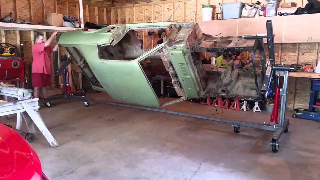1967 Mustang donor coupe on rotisserie. смотреть онлайн