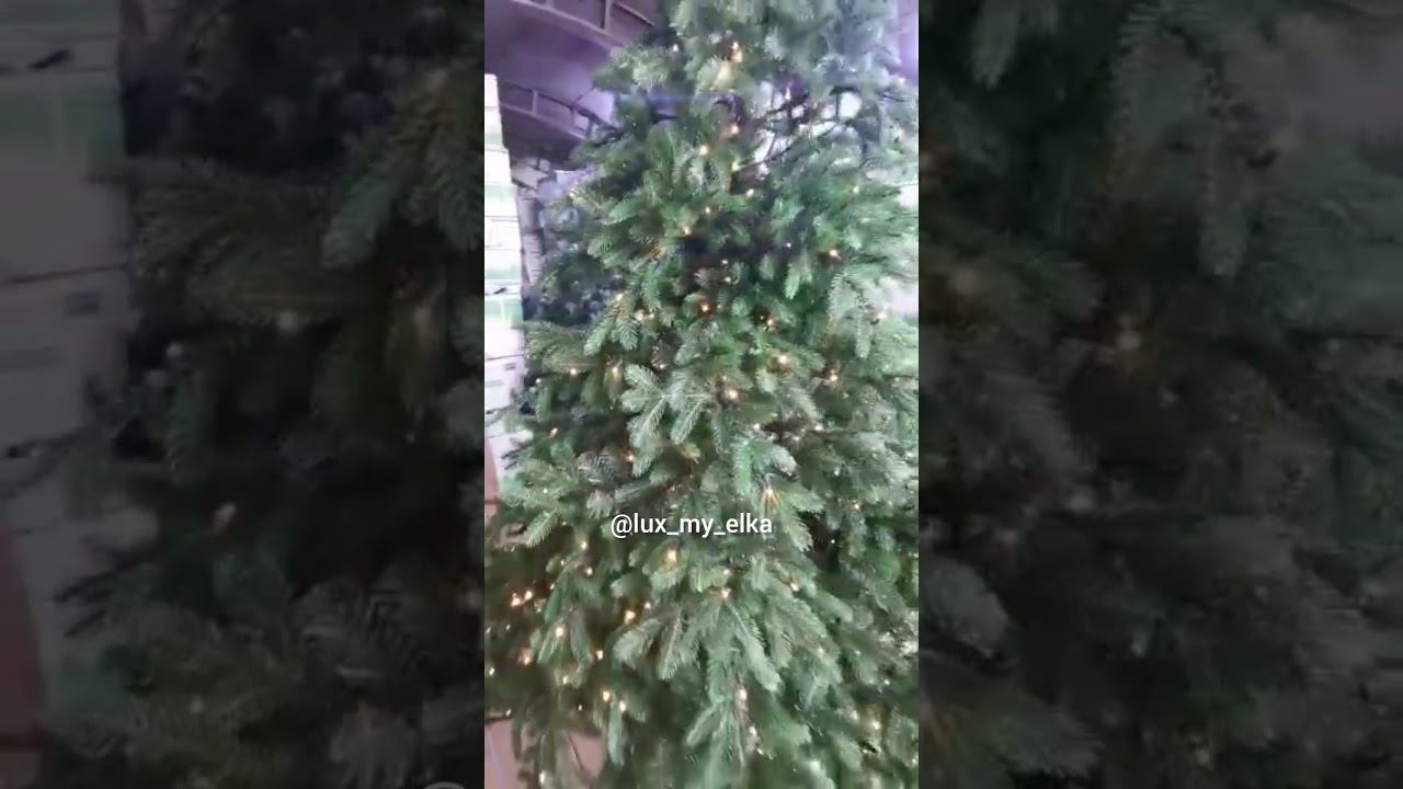 Искусственная комбинированная елка Феникс со встроенной гирляндой с шарнирным креплением веточек смотреть онлайн