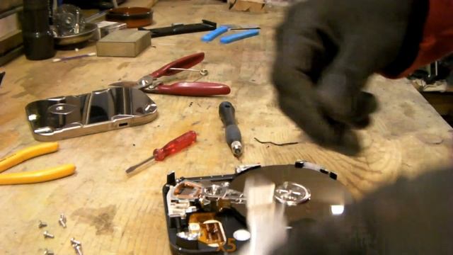 Howto Tear Down A Hard Drive To Get The Neodym Magnet Inside
