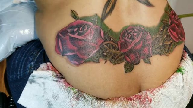 Roses on female lower back tattoo by Boris Kuryakin, May 05, 2018. смотреть онлайн