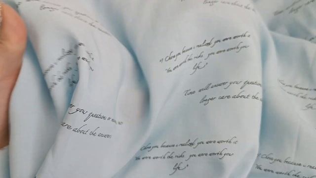 Штапель принт голубой надписи