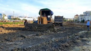 Great work! Smart operator bulldozer working push soil /Land transport by Heavy dump truck .