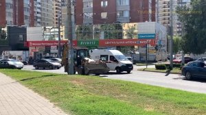 AMBULANCE responding, siren