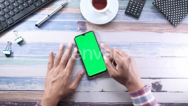 Businessman Using Smart Phone with Green Screen, Top View | Stock Footage - Envato elements смотреть онлайн