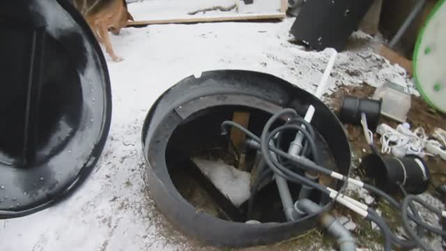 Отвод озона в водосточную трубу зимой.