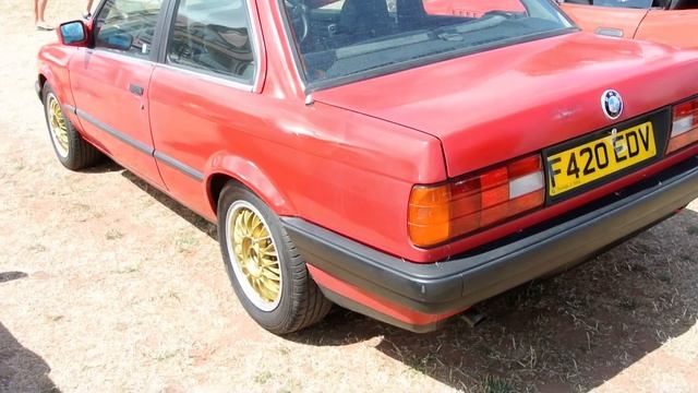 A 1988 BMW 3 Series parked on display смотреть онлайн