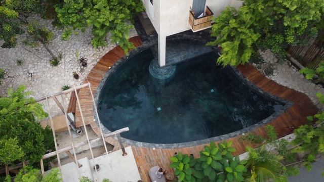 Botanica Tulum view of the Residency with the Pool and surrounding Garden смотреть онлайн