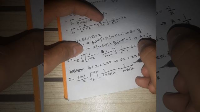 Integral of (tan x)/[exp(tan x) - 1] dx from(0 to π/2) смотреть онлайн