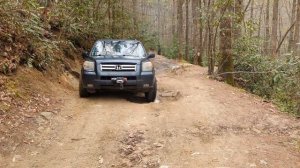 Honda pilot off road.