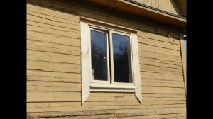 Окно  в старом брусовом доме.