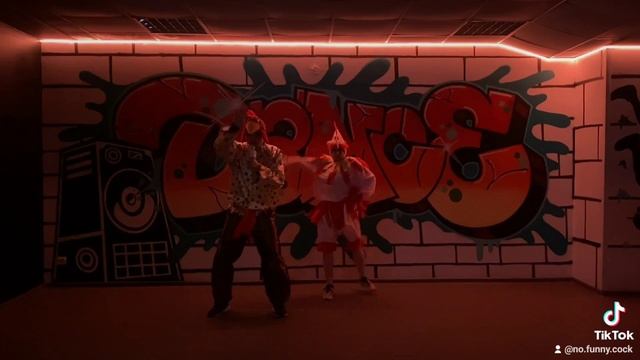 The Rooster Und Chiken Dancing. The Rooster Cackles To The Music. 2024