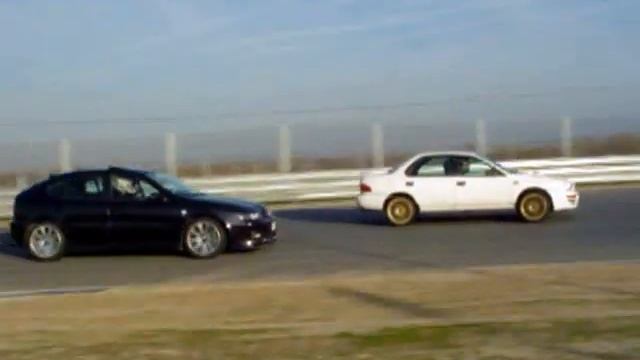 Lancia Thema Turbo 16v Vs Subaru Impreza - Jarama 2004 смотреть онлайн