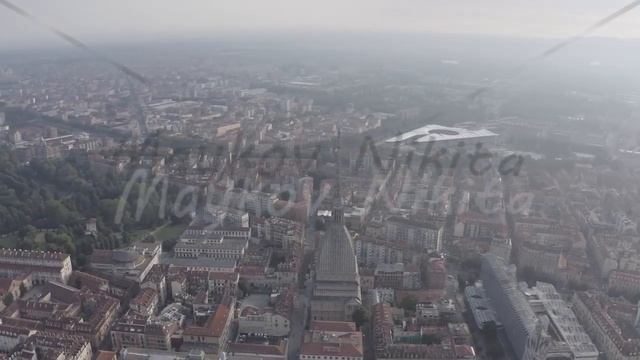 D-Log. Turin, Italy. Flight over the city. Mole Antonelliana - a 19th-century building with a 121 m смотреть онлайн