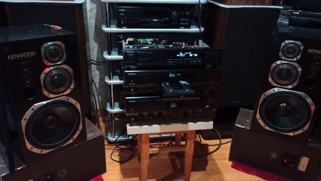 Kenwood DP-990D Against Kenwood DP-7050