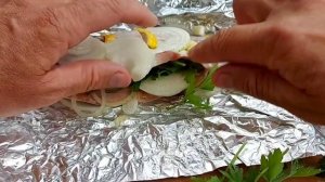 Форель в фольге на углях.