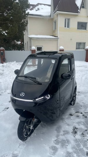 Трёхколёсный электроскутер