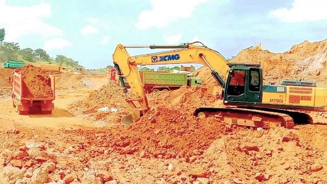 Dump Truk//mobil Truk SHACMAN Muat NIKEL ORE Vs Beko Besar XCMG.