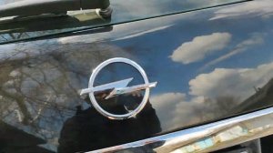 Багажник Опель Астра Н (дублирующая кнопка)