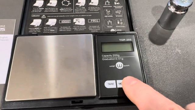 How to calibrate a Weigh Gram digital pocket scale Top-200 small scale calibration demo смотреть онлайн