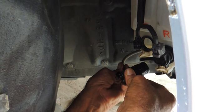 Toyota Prius Front Windshield Washer Pump Replacement