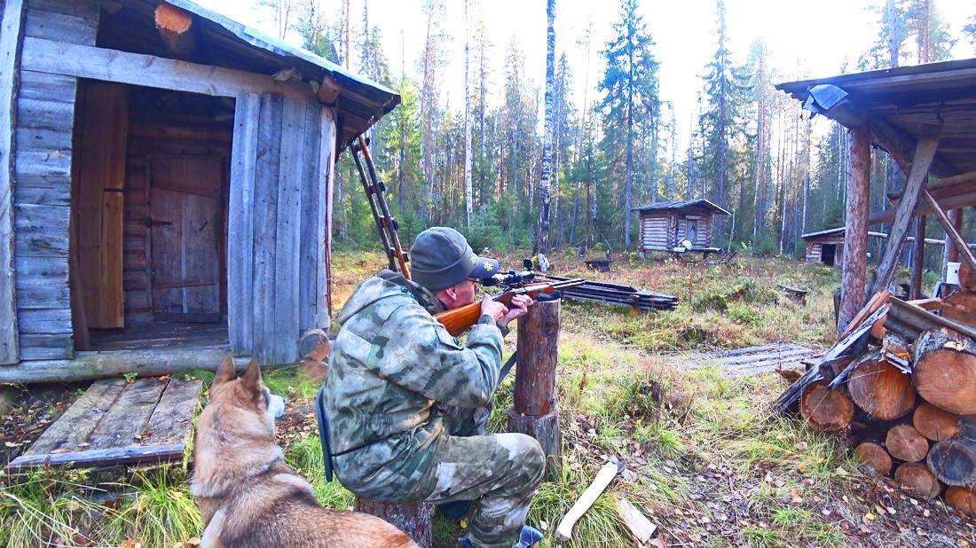 Перед охотой пристрелял ружьё. Утеплил избушку и приготовил ужин. Первое утро охоты 4 серия. смотреть онлайн