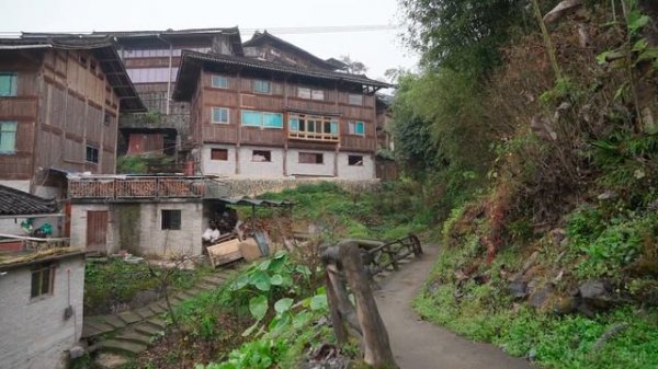 China rural village walk. Traditional mountain village life. Queniao Village, Guizhou