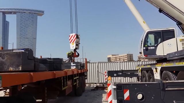 Terex 220 Ton Capacity Crane Installing Tower Crane Section