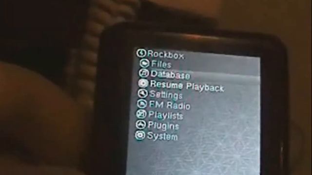 RockBox on sansa e200 V2 смотреть онлайн