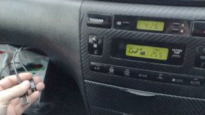 Android-магнитола с крутилками для Тойота Королла E120 с озона которая типа по месту.