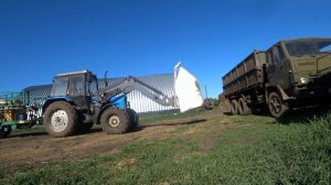 двигаю навоз разгружаю удобрение