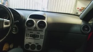 как снимается штатная магнитола опель корса