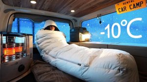 "Кемпинг в машине на горе в сильном снегопаде."