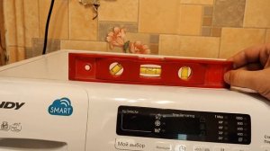 Как выставить стиральную машинку по уровню чтобы она не прыгала ?